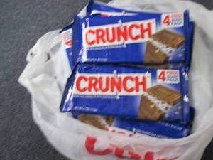 lot 384 image: 12- 2.7 oz Crunch Bars...