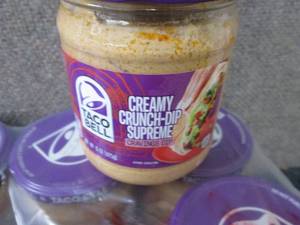 lot 398 image: 16- 15 oz Taco Bell Creamy Crunch-D...