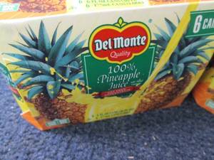 lot 403 image: 12- 6 oz DelMonte 100% Pineapple Ju...