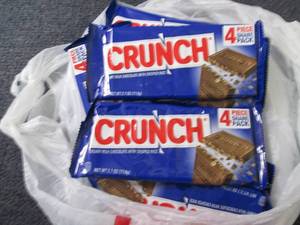 lot 382 image: 12- 2.7 oz Crunch Bars...