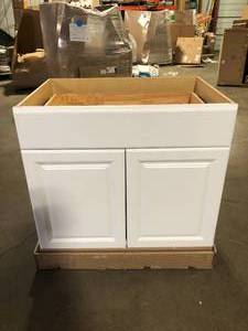 lot 6 image: Hampton Bay Hampton 36 in. W x 24 in. D x 34.5 in. H Assembled Sink Base Kitchen Cabinet in Satin White  Customer Returns See Pictures