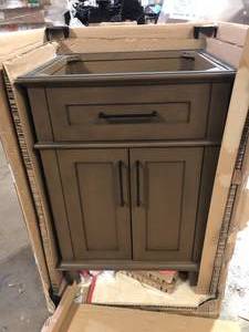 lot 7 image: Home Decorators Collection Sonoma 24 in. Single Sink Almond Latte Bath Vanity  (Assembled)   Customer Returns See Pictures