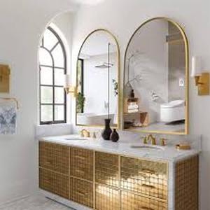 lot 9 image: Lirago 26 in. W x 38 in. H Arched Mirror for Bathroom Entryway Wall Decor Metal Frame Wall Mounted Mirror in Gold 2-Pieces     Customer Returns See Pictures
