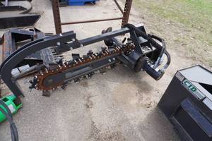 lot 10 image: Brand New CID Brand Toro, Dingo, Boxer Mini Skid Universal Mount Hydraulic Trencher Attachment