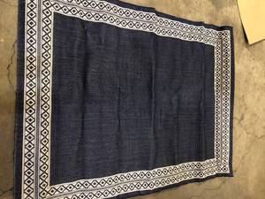 lot 21 image: Hampton Bay Navy 5 ft. x 7 ft. Diamond Border IndoorOutdoor Area Rug Customer Returns See Pictures