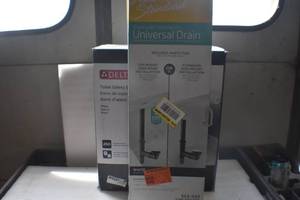 lot 17 image: Toilet safety bar and Universal Drain