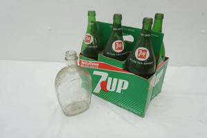 lot 2 image: Vintage 7up Liters (4ct) and Mt. Rushmore Log Cabin Syrup glass jar