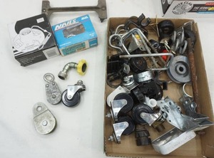 lot 66 image: caster wheels and other hardware supplies