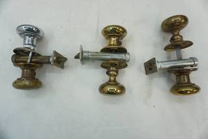 lot 71 image: Brass Door Knobs (1 is not brass)
