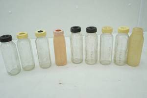 lot 78 image: Vintage glass baby bottles
