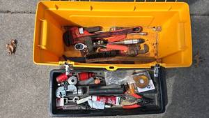 lot 18 image: Toolbox, includes pipe wrenches, wire cutters, hand brush, various bits, tubing cutter, files, grinding wheels, metal latches, removable internal tray.