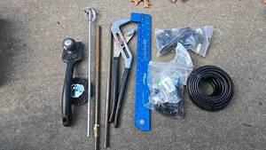 lot 25 image: Assorted Hand Tools Craftsman 45273 Pliers, Ruler, Sprinkler Accessories, Paint Mixer Set & more