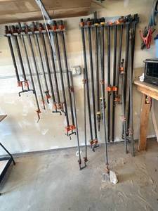 lot 74 image: Pipe Clamps on Wall w Rockler Holders