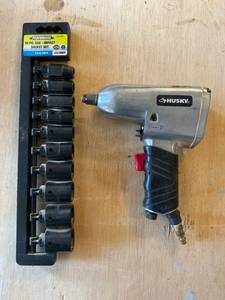 lot 96 image: Husky H4430 12 Impact Wrench, Performax 10 PC SAE Socket Set