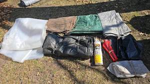 lot 176 image: Assorted Tarps and Plastic Sheeting, Multiple Colors and Sizes, Poly-Film Brand