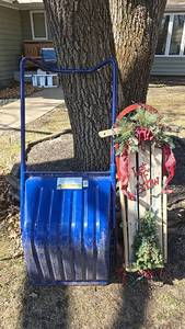 lot 177 image: Blue Plastic Snow Pusher with Metal Handle & decorative Sled