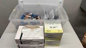 lot 82 image: Lot of Misc. Dental & Medical Supplies  Includes Finger Splints, Light Covers, Chin Guards, Tube Holders & More  Great Variety for Clinics, Offices, or Home Use  Bulk Lot Packed with Essential Items