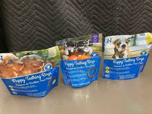 lot 27 image: Assorted Puppy Teething Rings in Pumpkin, Peanut Butter, Chicken Flavors