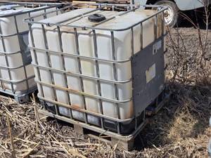 lot 16 image: 275-Gallon Tote Container with Metal Cage