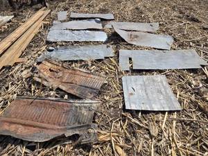 lot 53 image: Vintage Corrugated Tin Sheets with Decorative Patterns