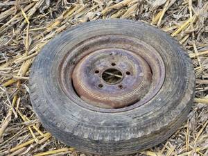 lot 58 image: Used Remington Deluxe Tire Wheel 6.00-16