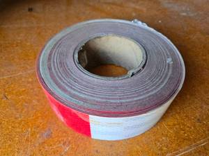 lot 167 image: Reflective Red and White DOT Tape Roll