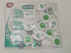 lot 134 image: Large GUM Pack - 180 Flex Picks - 9 Rolls Pro Weave Floss - 4 Travel Floss Kits