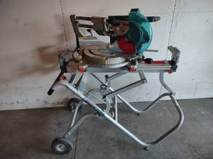 lot 5 image: Makita XSL06 10 Cordless Sliding M...