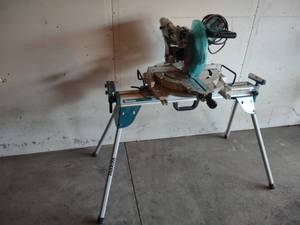 lot 6 image: Makita 10 Sliding Miter Saw with S...