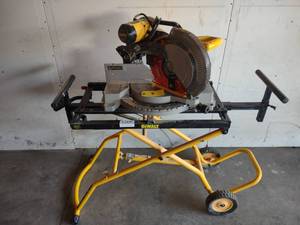 lot 8 image: Dewalt 12 Miter Saw with Stand...
