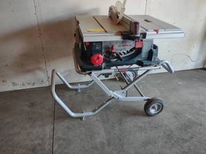 lot 12 image: Bosch 10 Table Saw with Stand...