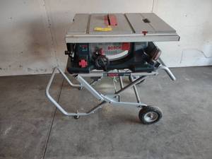 lot 13 image: Bosch 10 Table Saw with Stand...