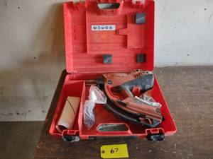 lot 67 image: Hilti GX120 Nailer...