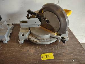 lot 83 image: Dewalt 12 Miter Saw...