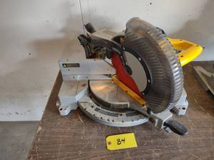 lot 84 image: Dewalt 12 Miter Saw...