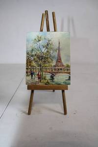 lot 15 image: Miniature Eiffel Tower Painting on Easel