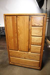 lot 130 image: Thompson Oak Solid Wood Armoire by Montana Furniture