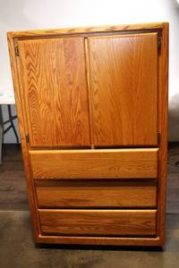 lot 131 image: Montana Furniture Industries Oak Armoire with Shelves and Drawers