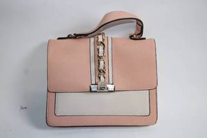 lot 149 image: Elegant Pink and White Handbag with Gold Chain Accent