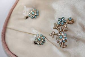 lot 180 image: Jewels by Helene Floral Brooch and Clip-On Earrings Set