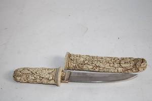 lot A-268 image: Ornately Carved Faux Ivory Dagger with Stainless Steel Blade