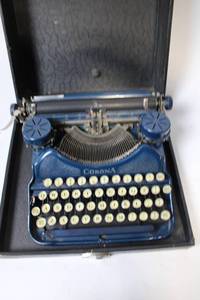 lot 323 image: Vintage Blue Corona Portable Typewriter with Case