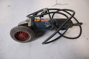 lot 476 image: Used Ryobi Angle Grinder with Grinding Wheel