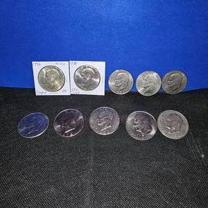lot 14 image: 10 Ike Dollars