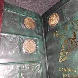 lot 55 image: (2)NAHC Brass Coin Sets