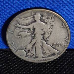 lot 89 image: 1929-D Walking Liberty. Fine