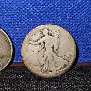 lot 35 image: (2) 1918-S Franklin Half $
