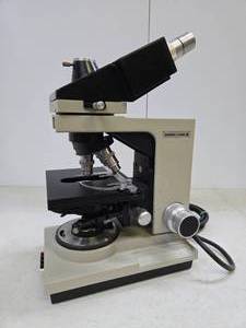 lot 210 image: Heavy Duty Commercial Grade Bausch & Lomb Balplan Microscope