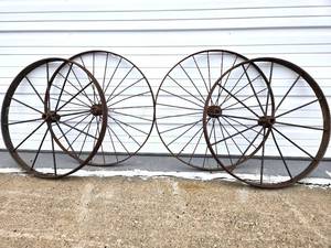 lot 18 image: 2 Pairs of Antique Iron Wagon Wheels