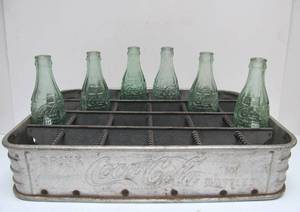lot 285 image: Vintage Embossed Steel Coca Cola Advertising Bottle Carrier with Original Period Bottles